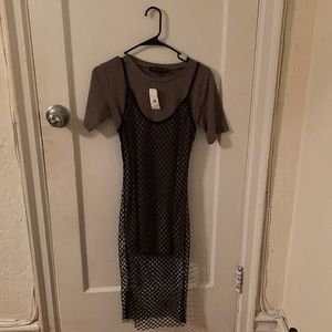Woman’s size small grey dress over mesh.